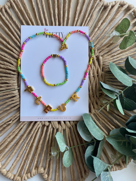 Rainbow seed bead, personalised gold charm necklace